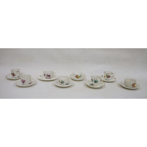 40 - Seven assorted Nymphenburg cabinet teacups and saucers, each with foliate decoration, and one furthe... 