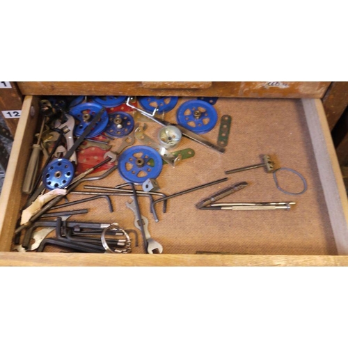 420 - Large quantity of Meccano, loose in two wooden collectors cabinets