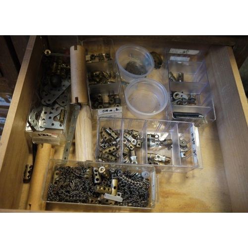 420 - Large quantity of Meccano, loose in two wooden collectors cabinets