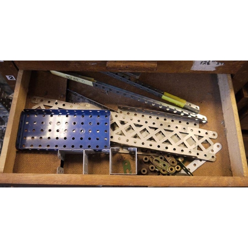 420 - Large quantity of Meccano, loose in two wooden collectors cabinets