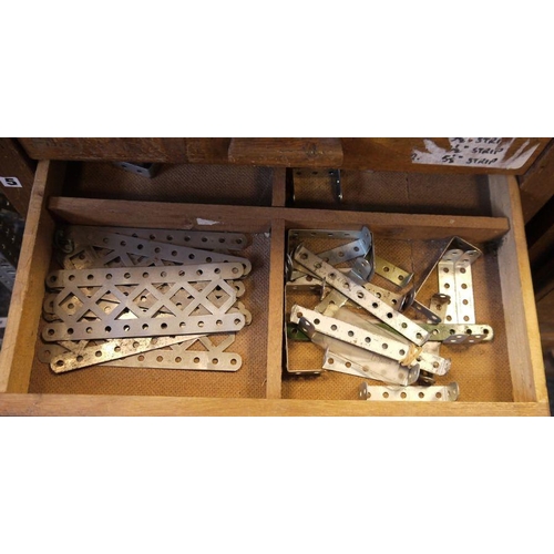 420 - Large quantity of Meccano, loose in two wooden collectors cabinets