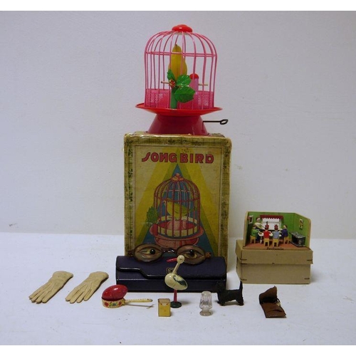 427 - Clockwork song bird toy, a pair of toy glasses, etc (2 boxes)