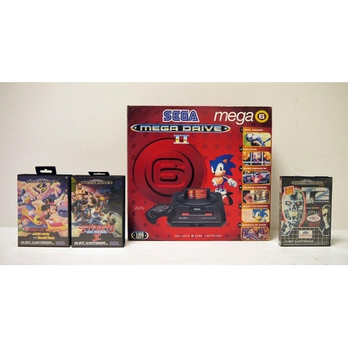 435 - Sega Mega Drive II mega 6 boxed with three games 'Streets of Rage II', 'World of Illusion' and 'T2'