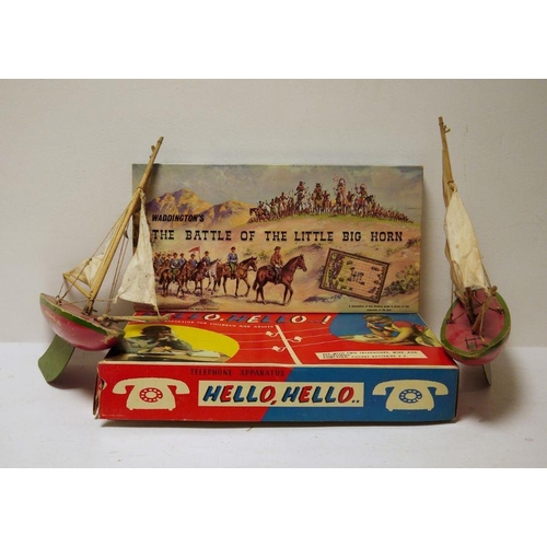 444 - Two old painted wood red and green model pond yachts and two boxed games (1 box)