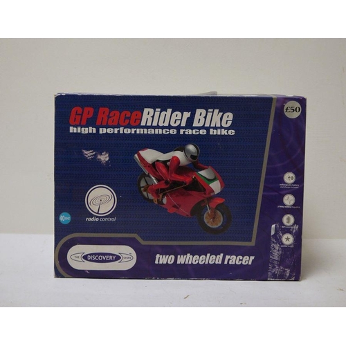 461 - The Discovery Story GP Race Rider Bike, boxed