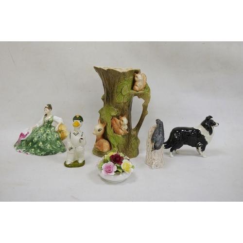 55 - Royal Doulton figure HN2474 'Elyse', a Beswick model of a border collie, a Goebel model of a bird, m... 