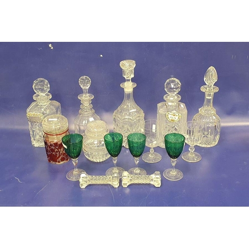 73 - Five various decanters, four green and clear etched stemmed wines with floral swag decoration, two c... 