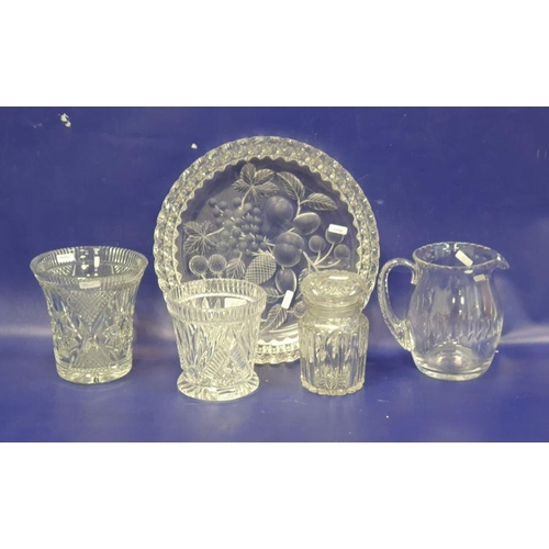 76 - Cut glass water jug, two slice cut vases, a canister and a large cut strawberry-pattern shallow dish... 