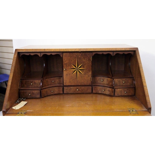 11 - 20th century burr walnut mahogany cross-banded and feather strung bureau, the interior with fitted c... 