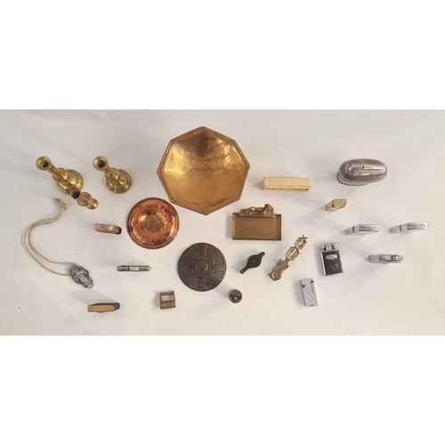 115 - Assorted metalware items to include copper ware, a selection of table lighters to include Ronson, et... 