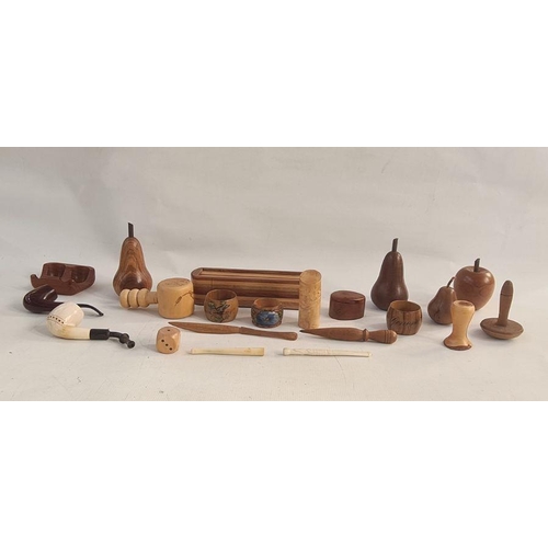 116 - Various items of treen to include carved fruit, eg apples, pears, etc, a pipe, nutcrackers, a pencil... 