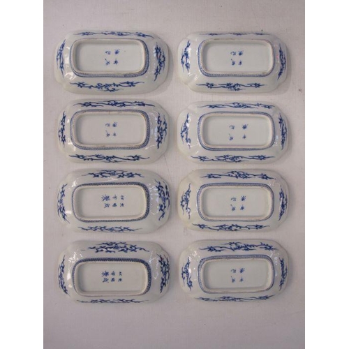 138 - Set of eight Chinese porcelain oblong dishes, each individually painted in underglaze blue with lake... 