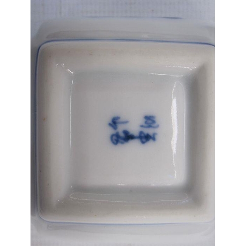 141 - Set of three modern Chinese porcelain miniature pickle dishes, square, blue peach decoration, 6.5cm ... 