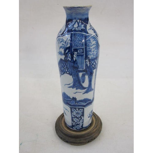 144 - Chinese-style delft slender shouldered and tapering vase with panels of ladies in garden, in undergl... 