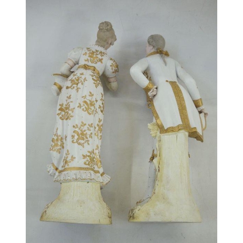 179 - Pair 19th century Sitzendorf gilt porcelain figures of lady and gentleman, the lady carrying bonnet ... 