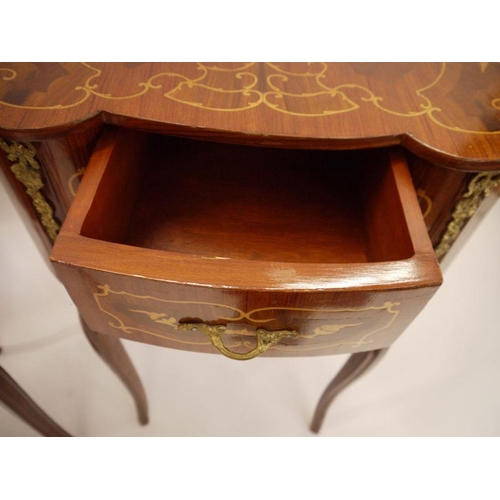 18 - Pair of 20th century French-style kidney-shaped marquetry inlaid two-drawer side tables, the shaped ... 