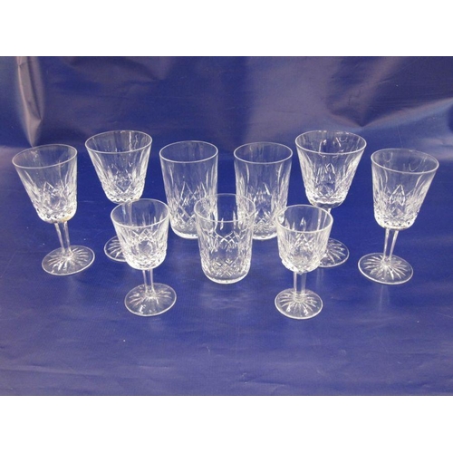 183 - Suite of Waterford cut glass 'Lismore' viz:- 12 large tumblers, 10 smaller tumblers, 10 stemmed red ... 