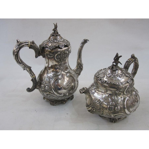 200 - Late Victorian silver tea and coffee service of five pieces, crested and decorated with embossed C-s... 