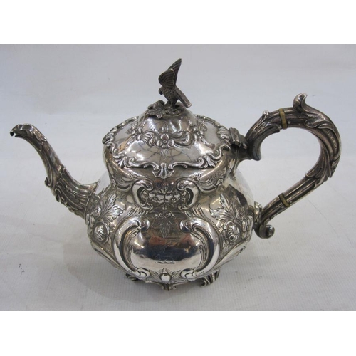 200 - Late Victorian silver tea and coffee service of five pieces, crested and decorated with embossed C-s... 