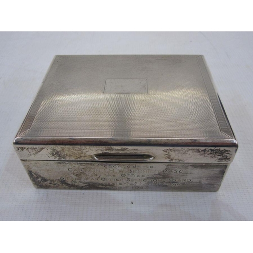 207 - Silver engine-turned decorated and lined cigarette box with inscription 'Presented to Captain I. H. ... 