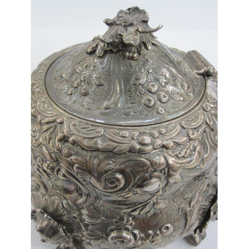 220 - Georgian silver teaset, milk jug and sugar bowl with embossed floral decoration, the C-scroll cartou... 