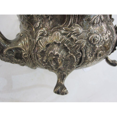 220 - Georgian silver teaset, milk jug and sugar bowl with embossed floral decoration, the C-scroll cartou... 