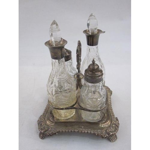 246 - Georgian silver cruet stand, London 1810, 13oz and four cut glass bottles