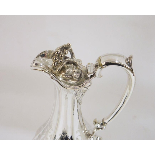 285 - EPNS plated claret jug engraved with vines, a Bacchus mask and engraved initials