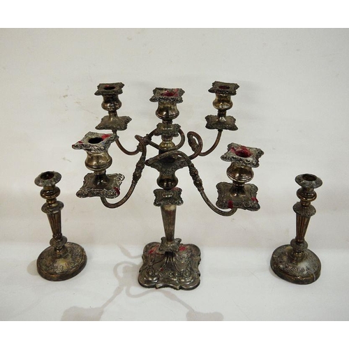 290 - Silver-plated candelabra of four arms and central holder and a matching pair of candlesticks (all ra... 