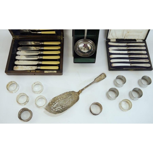 297 - Silver-plated fish server, assorted napkin rings in stainless steel and EPNS, a Viners stainless ste... 