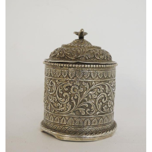 310 - Two Burmese silver-coloured metal trinket boxes, one rectangular with hinged lid, stylised floral an... 