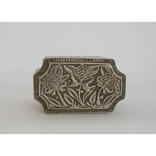 310 - Two Burmese silver-coloured metal trinket boxes, one rectangular with hinged lid, stylised floral an... 