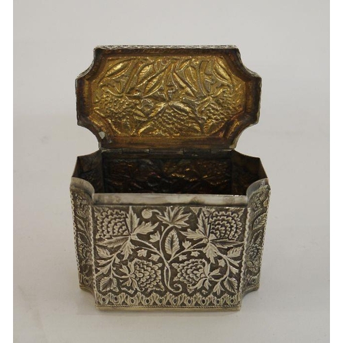 310 - Two Burmese silver-coloured metal trinket boxes, one rectangular with hinged lid, stylised floral an... 