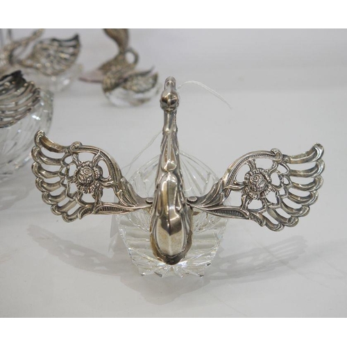 314 - Set of four silver and cut glass swan bowls, each with cut glass base, silver swan neck and folding ... 