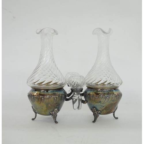 315 - French silver and glass oil and vinegar stand, the glass bottles with wrythen flared bodies, the sil... 