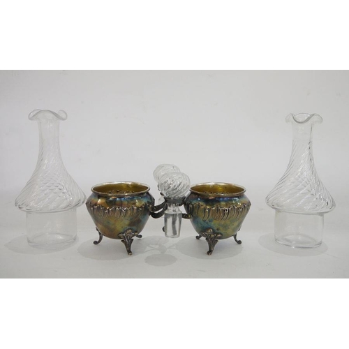 315 - French silver and glass oil and vinegar stand, the glass bottles with wrythen flared bodies, the sil... 