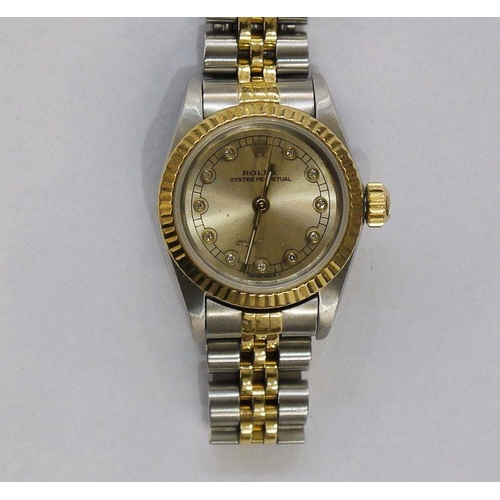 326 - Lady's Rolex Oyster Perpetual stainless steel and gilt metal wristwatch, the dial set tiny diamonds,... 