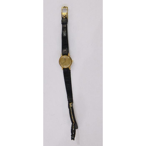 327 - Lady’s rolled gold Omega De Ville wristwatch with baton numerals, side button and the skin strap