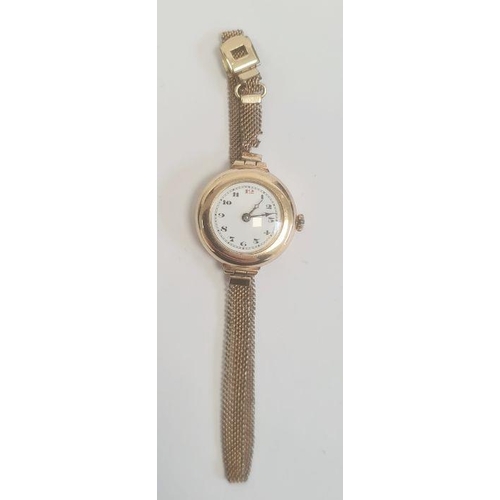 336 - Vintage lady's 9ct gold wristwatch with enamel dial, on rolled gold mesh strap