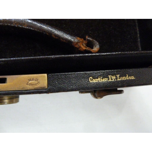 358 - Cartier Limited, London, brown leather travelling jewel box, brown velvet lined with trays and cover... 