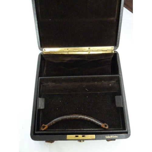 358 - Cartier Limited, London, brown leather travelling jewel box, brown velvet lined with trays and cover... 