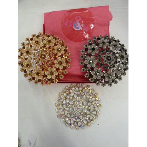 361 - Three large Butler & Wilson circular floral diamante brooches, one in shades of white, one in shades... 