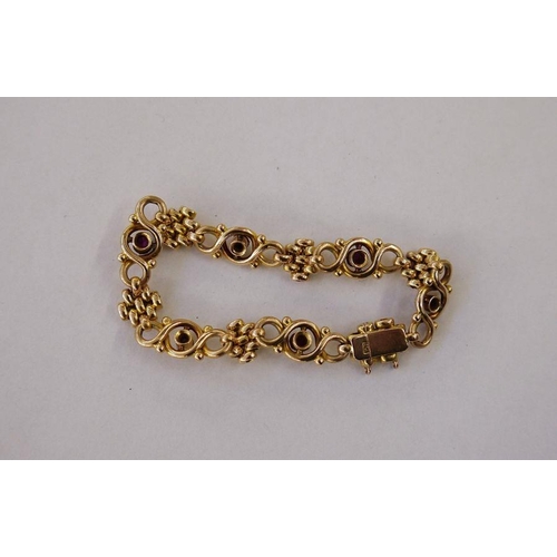 406 - 15ct gold, pearl and ruby-coloured stone ornate bracelet, trellis and scroll links set with three ol... 