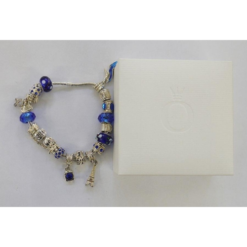 430 - Pandora-style charm bracelet with blue glass and other charms and a Pandora box