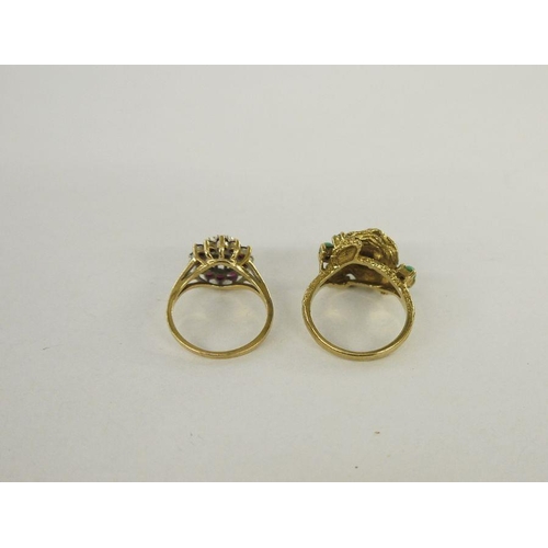 440 - 10K gold garnet cluster ring, 3g approx. and a 9ct gold flower ring, 5g approx. (2)