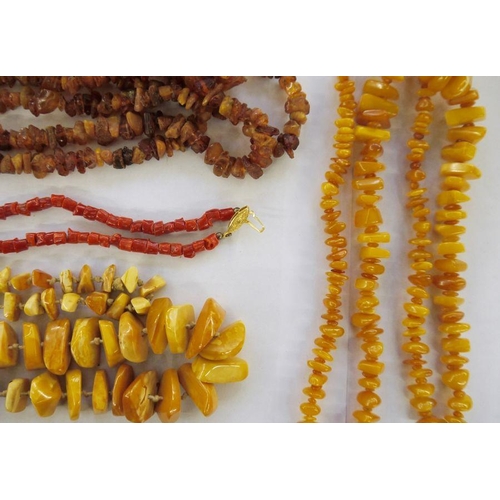 444 - One  rough amber beaded necklace. two other amber necklaces and a coral beaded necklace (4)