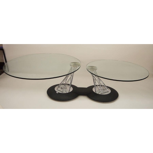 45 - Modern designer coffee table, the circular top with swivelling out to reveal second swivelling circu... 