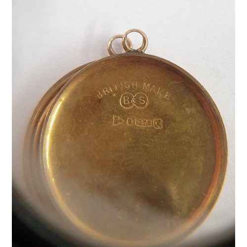 503 - 9ct gold circular locket, gross weight 2.5g approx.