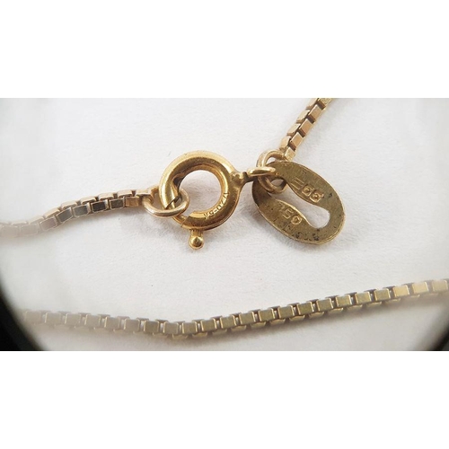 529 - 9ct gold crescent moon pendant with face, a 15ct cravat tie bar, various gold earrings and a chain