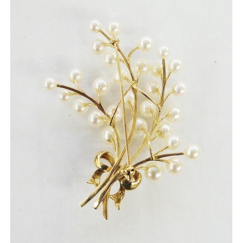 545 - Gold and cultured pearl spray brooch with bow detail, marked 14K, 7cm long